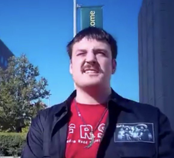 camhigby's tweet photo. I believe I have found many different photos of the Abdul supporting socialist who said I should be killed for being a capitalist. 

He goes to Wayne State University and his name *might be* Jackson. Help me identify. https://t.co/TnYTBsuptf