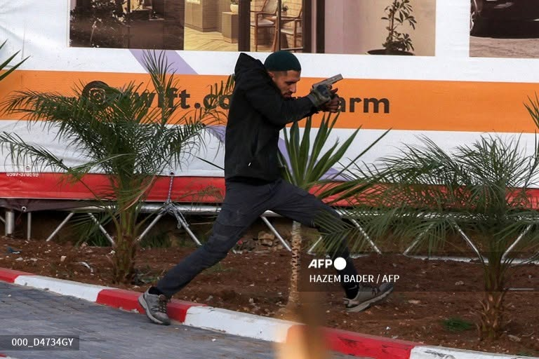 EBluemountain1's tweet photo. 🚨 Israeli security services are currently interrogating @hazemjbader a photographer who works for @afpfr suspected of having prior knowledge of the terror attack in Hebron today. Not the brightest, the idiot immediately posted the images on his @facebook page with The AFP stamp
It is alleged that he positioned himself for the best cover possible. Not Journalists simply Hamas operative with a camera funded by Western Media