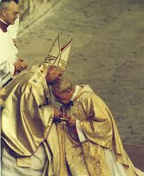 FrUgochukwu's tweet photo. On October 22, 1978, during the inaugural Mass of Pope John Paul II in St. Peter's Square, a historic and deeply emotional exchange took place between the newly elected Polish pontiff and his mentor, Cardinal Stefan Wyszyński, the Primate of Poland.

As the College of Cardinals processed forward to pledge obedience and kiss the papal ring, Cardinal Wyszyński who had been a mentor and close ally to Karol Wojtyła for years approached the altar. When Wyszyński moved to kneel, John Paul II immediately stood up, prevented him from kneeling, raised him to his feet, and embraced him.

Cardinal Wyszyński insisted on showing traditional reverence, and the Pope held him tightly, kissing his face, head, and hands in a powerful sign of gratitude and respect.

On October 23, 1978, the day after the ceremony, Pope John Paul II publicly acknowledged the cardinal's immense sacrifice and leadership under communist persecution, stating: "This Polish pope... would not be on Peter's Chair were it not for your faith, which did not retreat before prison and suffering."

Both Churchmen were instrumental to the collapse of communism in Poland.