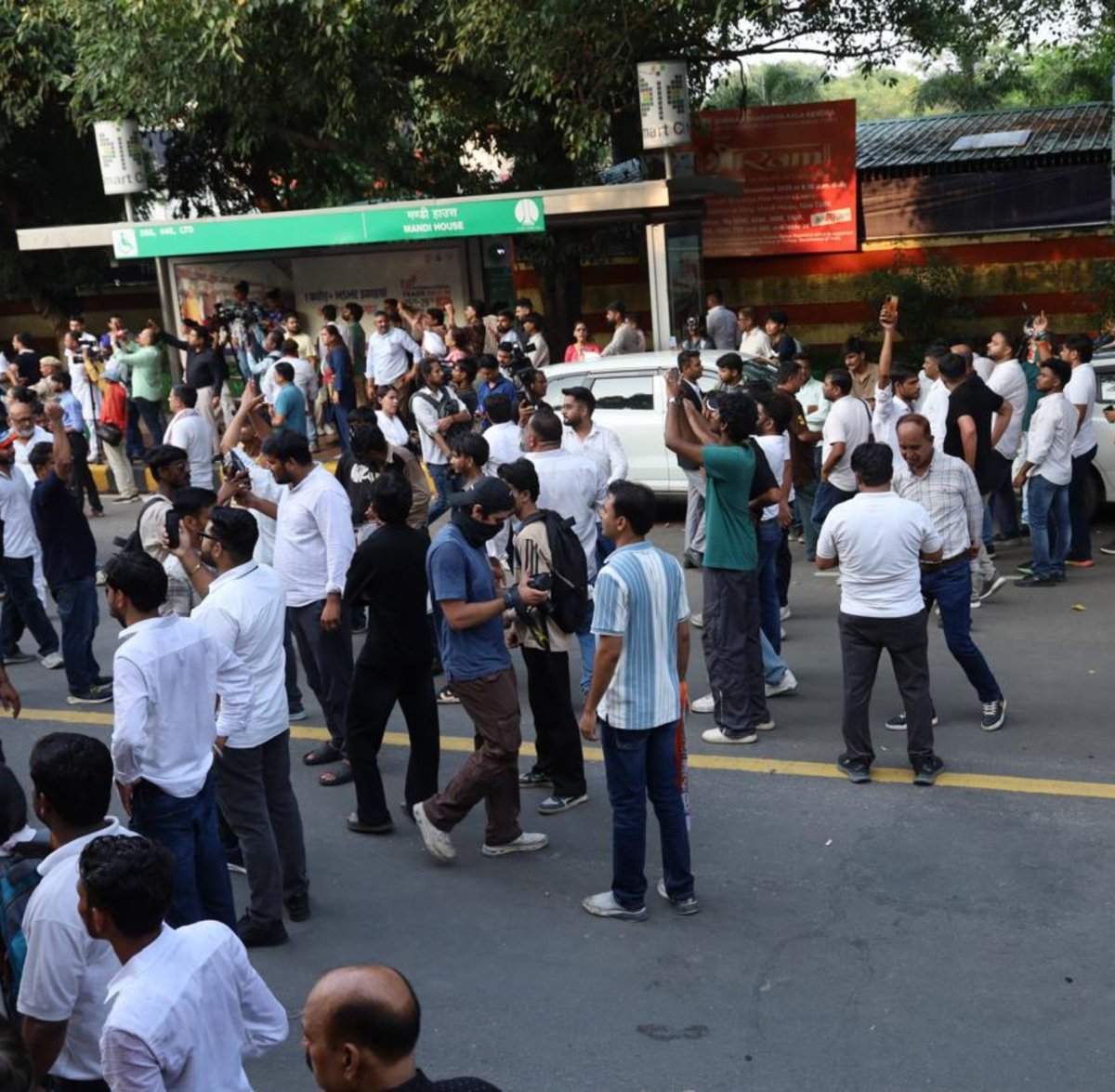 IYC's tweet photo. 🚨 BJP's propaganda machinery questioned whether Raihan Vadra was even at the protests.

Well, here's your answer. Camera in hand, right among the protesters. 

First, they wanted his protest photos and even the TIRANGA removed.

Now they're trying to discredit the artist.

Scared of the photographs. Scared of the Tiranga. And now attacking the photographer.

How insecure can you get?