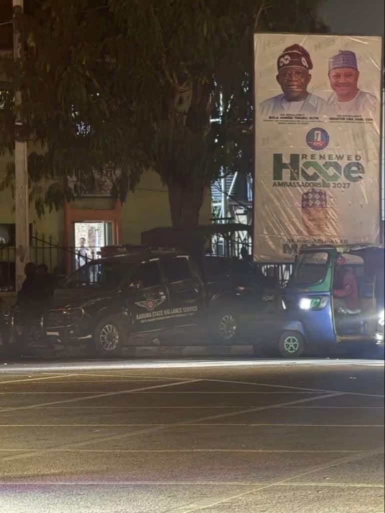Abdool85's tweet photo. It's worth noting that whenever a high-profile person is visiting town, security operatives are always deployed to flashpoint areas like markets, roundabouts, flyovers, places of worship, and other strategic locations. It's a standard practice that happens everywhere.

Even during the last administration of President Buhari, police and other security personnel were deployed to these flashpoint areas, as you can see in the first frame.

So, the claim being shared by aggrieved ADC members that security operatives have been deployed specifically to guard President Bola Ahmed Tinubu’s billboards in Kaduna State is completely baseless. It only shows they have lost ground in the state and across Nigeria.

But if you insist those security personnel are actually guarding those billboards, then we will simply say we are maintaining the tradition we inherited during Baba Buhari! 😆