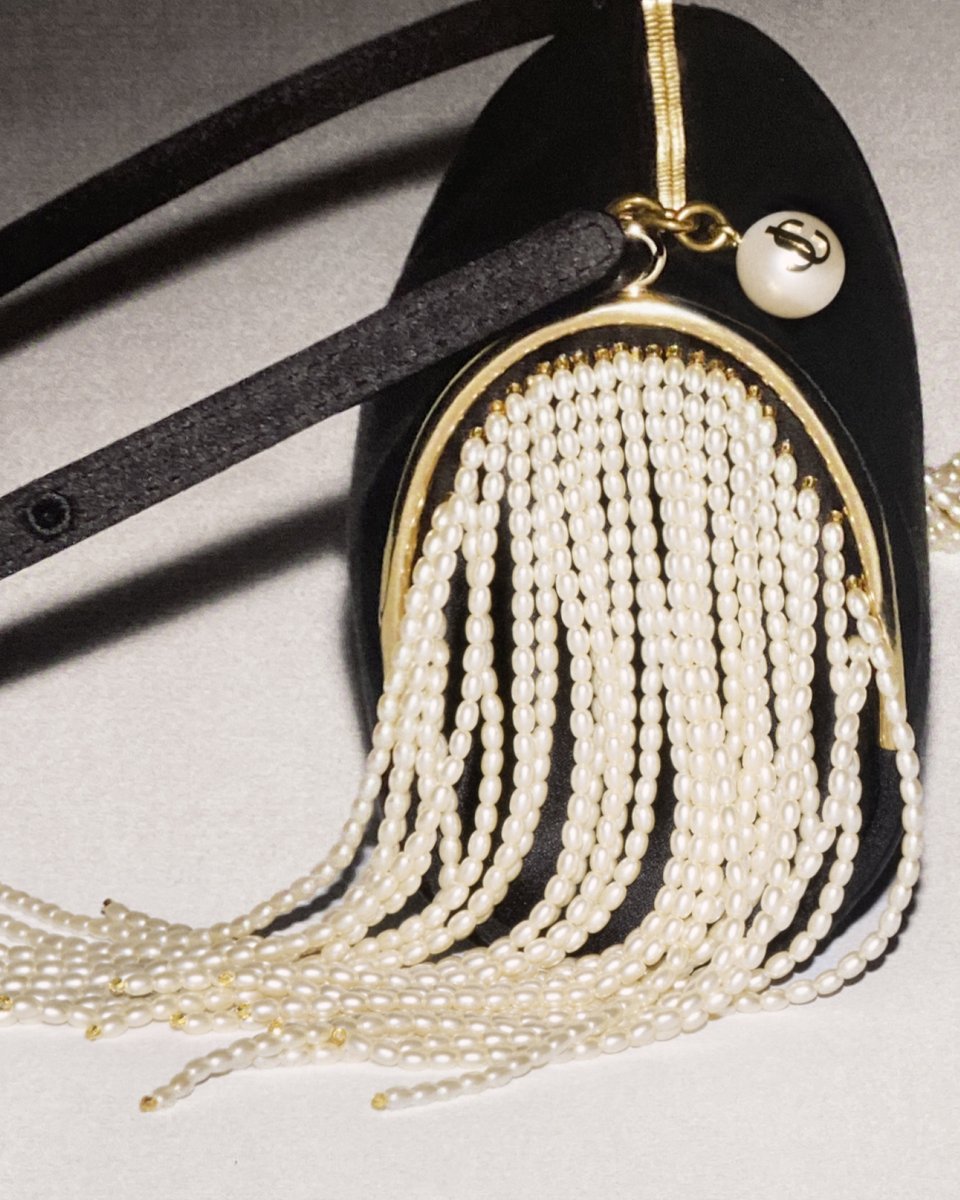 jimmychoo's tweet photo. The art of embroidery, showcased by the Irina sandal and Tube Mini Bag: each hand-adorned with resin pearls.

Pearls of Wisdom.

#JimmyChoo

https://t.co/zSIkTAMU8v https://t.co/BpbZ9ugEYE