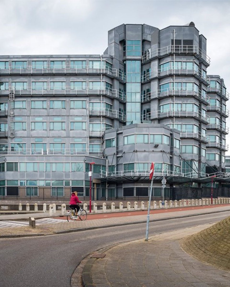 jjpcodes's tweet photo. the hilarious thing about the Dutch spies is that, unlike serious countries who base their spies with an inspiring view of the capital (eg MI5), the Dutch AIVD is based in Zoetermeer, a depressing hellhole.
it's full of decaying 70s buildings, has nothing to do, and is strategically equidistant from the nearby cities anyone would actually want to live in. 

To really inspire the spies and make them patriotically defend the fatherland or whatever they then stick them in this grey brutalist horrorshow of a building opposite the ring road and some big box stores; originally it was the education ministry but they decided it sucked in Zoetermeer, went back to The Hague and palmed off the building on the spooks. Oh and the spooks are not paid well either lol.

It's a miracle there isn't a constant stream of Dutch double agents betraying their country that clearly doesn't value them in the slightest