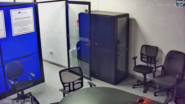 Random_Robbie's tweet photo. A police station's interior camera is wide open over RTSP: the server rack and offices, watchable by anyone - on a DVR whose clock says the year 2091. rtsp has_screenshot:true -tag:honeypot #shodansafari https://t.co/XsgWWanQbV