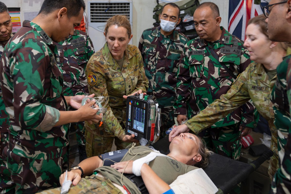 DefenceAust's tweet photo. Battlefield medicine in action 🇦🇺 🇮🇩

Australian and Indonesian military medical personnel put their skills to the test during a casualty treatment demonstration as part of Exercise Keris Woomera 26 in East Java.   

From extracting a casualty from a Protected Mobility Vehicle - Ambulance, to triage, emergency treatment, simulated surgery and evacuation planning, the activity showcased how Role 2 Forward teams deliver critical care in demanding field conditions.

Led by personnel from 2nd Health Battalion, 3rd Health Battalion and Maritime Operational Health Unit, the demonstration highlighted the close cooperation and interoperability between the ADF and Indonesian Armed Forces (@Puspen_TNI).

Exercise Keris Woomera 26 brought together more than 2,200 personnel from both nations, strengthening readiness and partnerships through shared training.

#YourADF #KerisWoomera