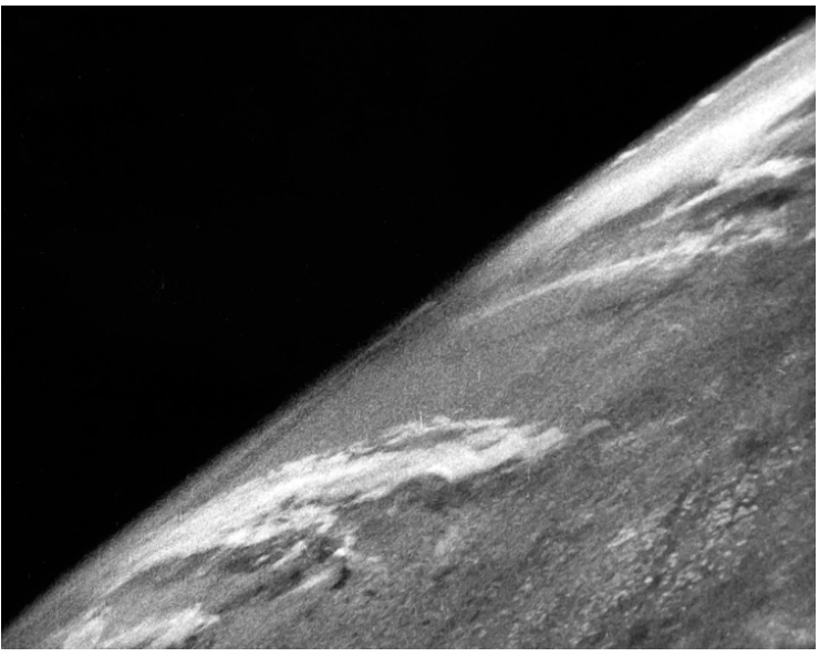 NASAhistory's tweet photo. 80 years ago today, the first images of Earth from space were taken. A 35mm camera mounted on a captured V-2 rocket launched from White Sands Missile Range in New Mexico. This photo is a frame from the rocket's journey to 65 miles (105 km) above Earth's surface. https://t.co/FgCcqXCsDO