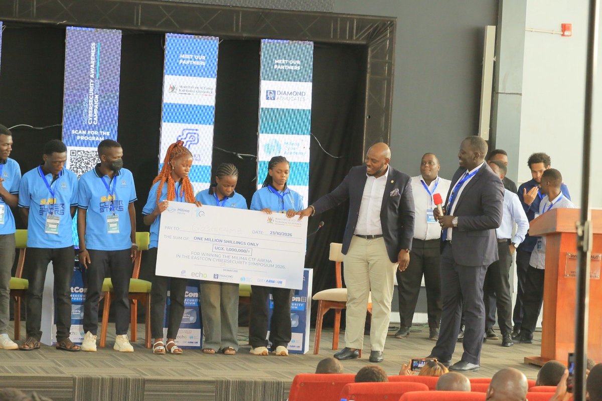 CyberMilima's tweet photo. @JonnnieT, Governance and Risk manager at NITA-U, in his final remarks congratulated all the teams that took part in the CTF as the future of cyber resilience.

“To the winning team and everyone who competed: 

Don't stop here, keep pushing forward.

@NITAUganda1 will keep supporting innovators and you'll find that support across different platforms.”

#Cybersecurity doesn't discriminate and he commended the ladies on the winning team.

The way we control technology is through technology. The opportunities in cybersecurity are limitless, and he believes it's the right path for everyone in any field.

#CSAM26 #MilimaAt10 #Cybersecurity #EastCon26