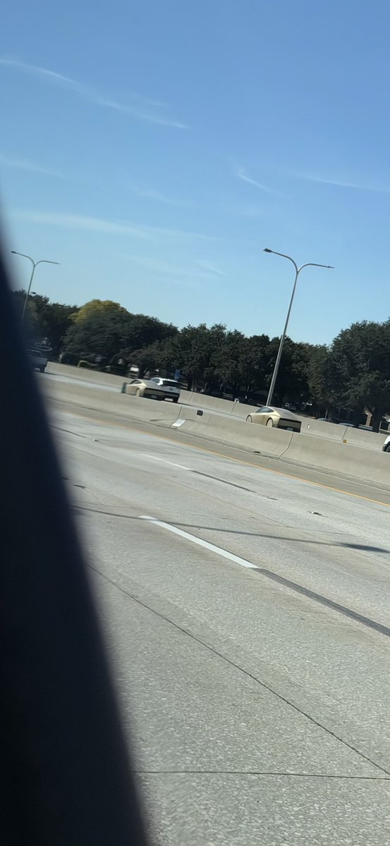 InnovatingCoin's tweet photo. Just caught 2 Tesla Cybercabs driving southbound on the Dallas North Tollway in Plano, TX! https://t.co/0jx5hc846w