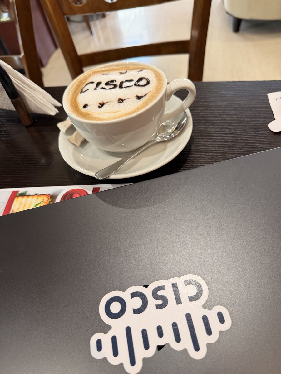 OnijeC's tweet photo. “Don’t keep quiet 🤫 just speak up and that one opportunity could be yours” 

This incredible waiter at Houes 43 Abuja made a special coffee told me about Cisco seeing the sticker on my laptop and I enrolled him on @CiscoNetAcad to pursue a career as a SCO analyst. https://t.co/49y25zR2iS