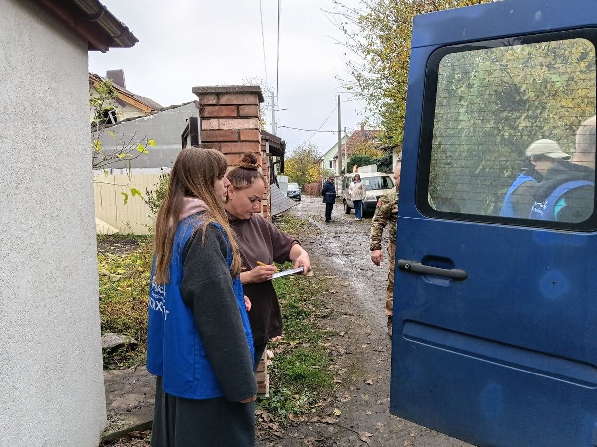 UNHCRUkraine's tweet photo. After devastating aerial attacks on Kyiv in recent days, UNHCR and partners are on the ground providing urgent support. Affected families are receiving psychosocial support, legal aid and emergency shelter materials, and are being registered for emergency cash assistance. https://t.co/LSK5XEEKqq