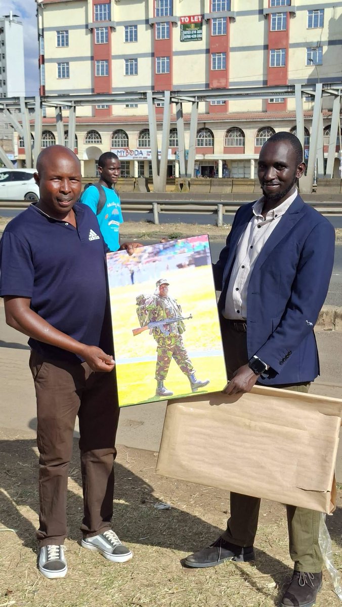 Techsupport97's tweet photo. Finally, Company Sergeant Major (CSM), Warrant Officer II (WOII) Davis Lang’at, received his gift from Joshua Kigen, who took the photo. https://t.co/oJcVWAUn6V