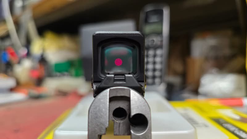 LarryVickers's tweet photo. As most of you know the @AimpointUSA COA is the new closed emitter RDS from Aimpoint that has been getting a lot of buzz. It features the same size viewing window as the ACRO P2 with a smaller housing. The size of it integrates into many pistol slides much better than the P2 - as time goes on more and more pistols are being modified to accept it. One of the latest is the 1911 which means of course the 2011 as well. ATEi executed this installation and as you can see they knocked it out of the park. This slide will be finished up into a 9mm light rail pistol in the near future. Once it is done I’ll post pics of the completed handgun. ATEi has been mounting RDS to a variety of pistols for quite some time now and have established themselves as an industry leader. Check them out if you’re in the market for RDS pistol installs.