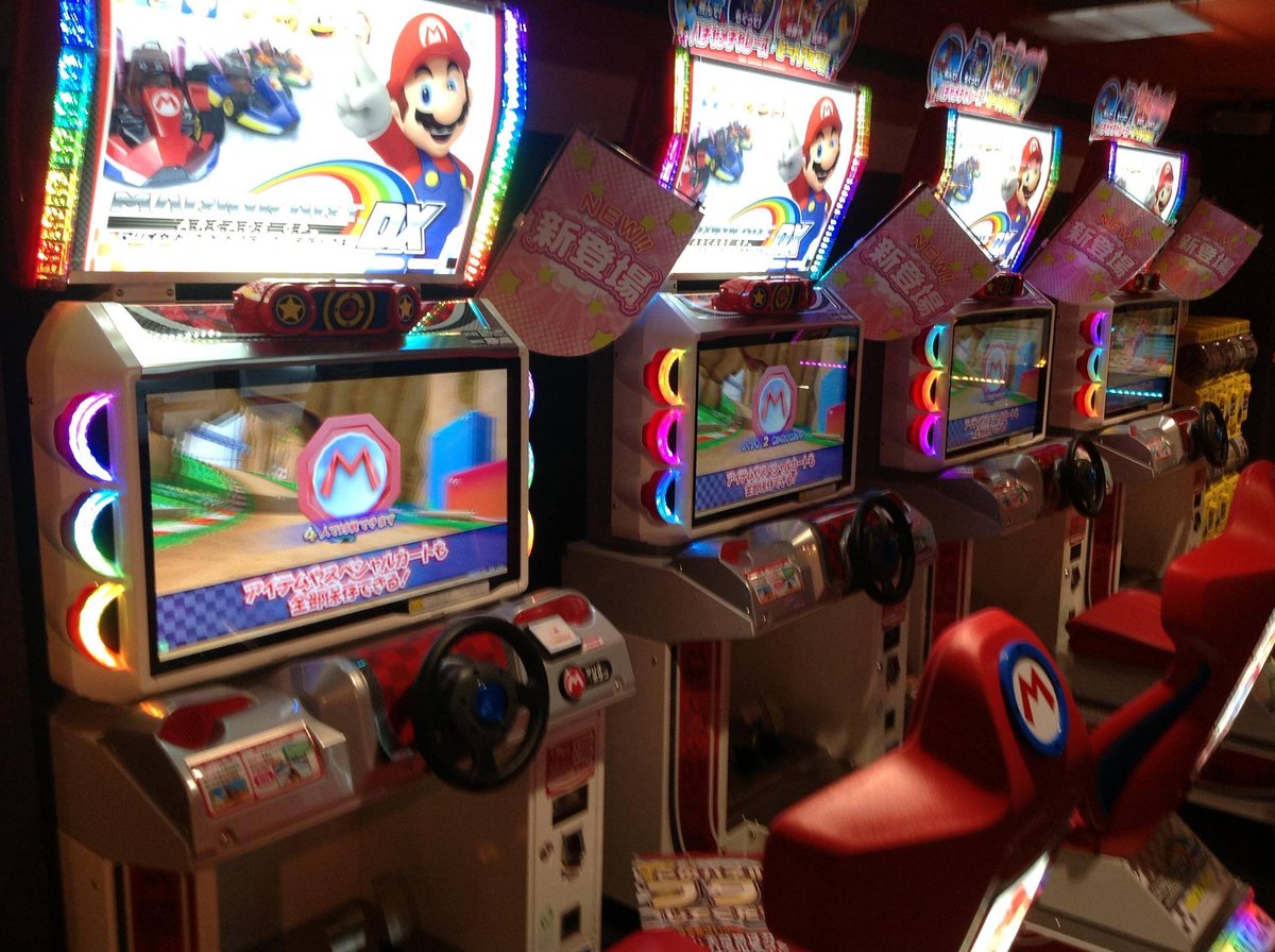 InfinitaleComic's tweet photo. I had a blast playing Mario Kart GP DX in Akihabara before Sega closed their 3-story arcade there. 

You could acquire and cash-in collected coins to a little plastic card that was available for purchase there as well.

I wish I didn’t lose that Namco Card during my various relocations. I bet I still had enough to buy some sweet power-ups for Luigi and his ride!