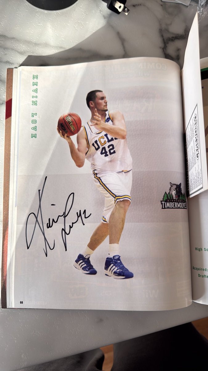 WolvesEnthu5's tweet photo. Going through some old things and came across an absolute gem. The yearbook from the 2008-09 season. Featuring rookie Kevin Love with his signature! https://t.co/h88CBWhiDX