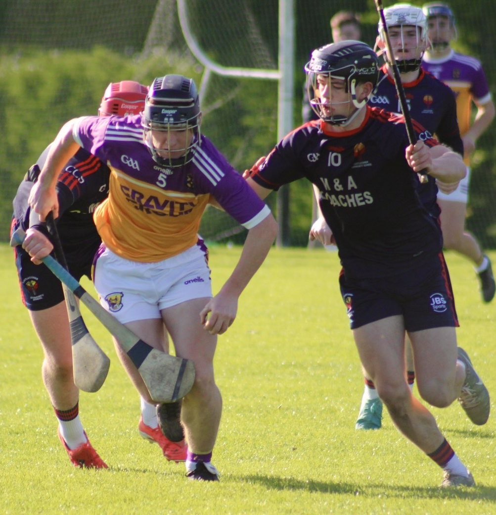 WexfordCBSGAA's tweet photo. Massive thanks to TY student Barra Fortune for these smashing action photos from today’s Senior Hurling win against Castlecomer CS in the Leinster League.📸🔥
More on FB. 
#CBSbuilt
🟡🟣 https://t.co/xUKYgoylGc