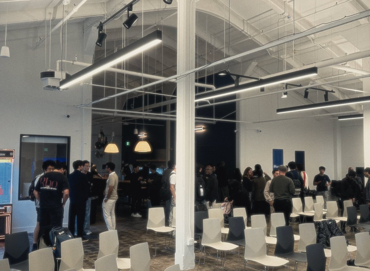 superintel_xyz's tweet photo. @QuanVng at @fdotinc yesterday on physical AI. 

The talk ran like a product brief, crisp, no hype. 

Notes for those who missed it:

1. Physical AI is a superset of LLM problems. More complex. More dimensions. Bad data costs more.

2. There is still no clear path to autonomy (think: deploy into a hospital, cross an API boundary, keep it reliable). Distill what you learn and share it. The industry benefits from this.

3. Their product bet: one model that does everything. One policy builds trust across tasks. Years of work. Several breakthroughs. Goal is to decouple data scaling from the robot body, then turn internal success into user outcomes as soon as it is real.

4. How they learn: pick a hard, open-ended task (laundry fold works because many solutions are valid). Run evals at scale. New environments surprise you, it is hard to estimate how many runs are needed 

5. Scaling hierarchy from the talk: API first. Then more robots and bigger models. Edge compute and energy are the long-horizon hard problems.

6. Industry posture: measured comms. Don't undersell. Don't oversell. Reliability is the north star. The hard part is the problem itself.

7. Open systems build shared context. Shared context is how teams ship autonomy with confidence.

That is what we wrote down. Happy to be corrected on any line!