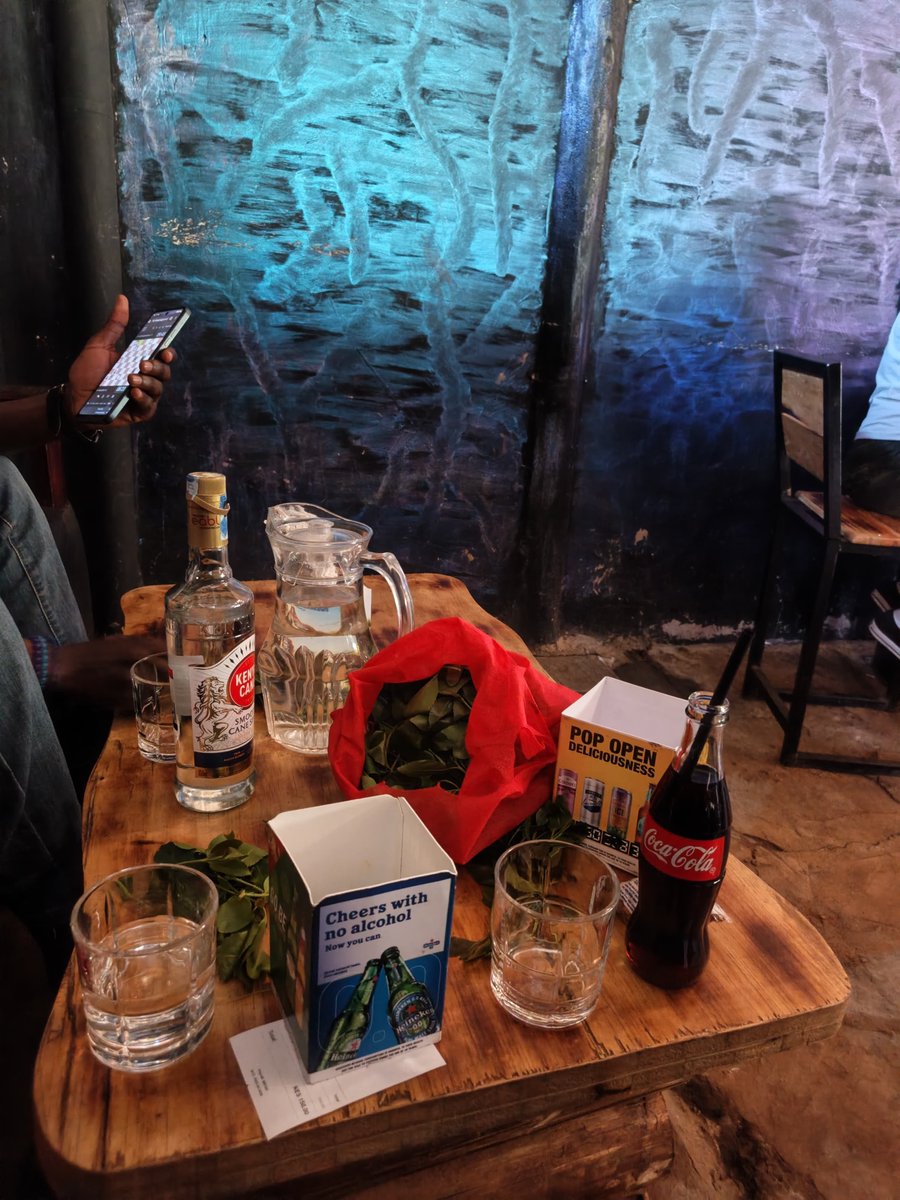 CodeWith_Erick's tweet photo. after a long and busy Friday, I'm out with my long time friend to touch some grass.

just a cool music, Coca-Cola for me, 'big drink'  for my friend and some khat for us all💚

it's weekend 🙌 https://t.co/O95ARFUctI