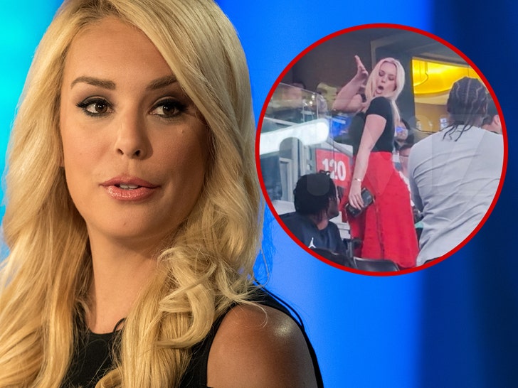 TMZ's tweet photo. 🚨 Trump staffer Britt McHenry forced to resign after throwing drink at fan at NBA game.

Details: https://t.co/M8reZgXpRV https://t.co/Y71CaSXS1J