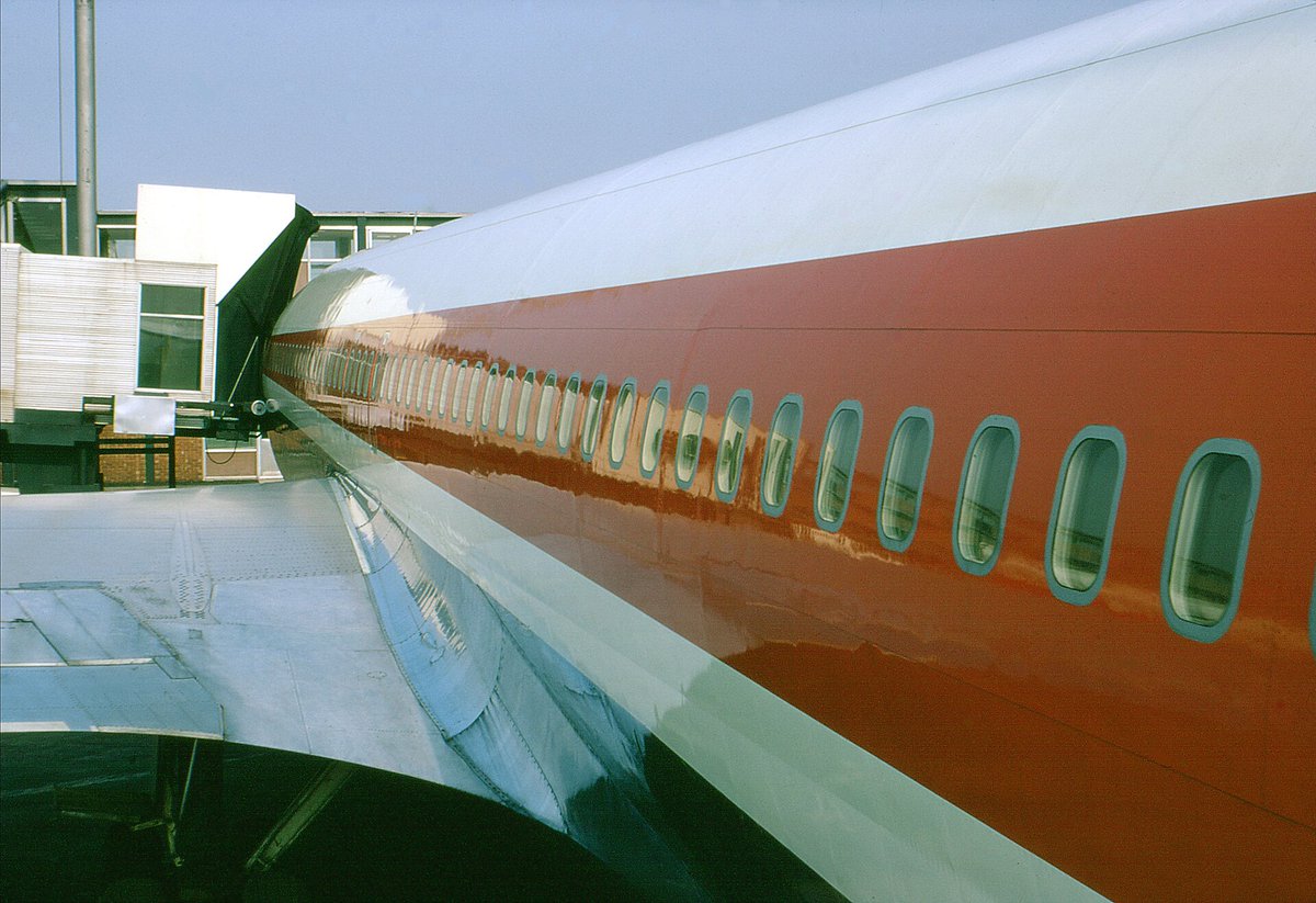 FlyTransWorld's tweet photo. London Heathrow, April 1969, looking down the side of our StarStream 707 N770TW from the rear steps. Crossing the Atlantic in style. #FlyTWA https://t.co/3Y18FfmDvm