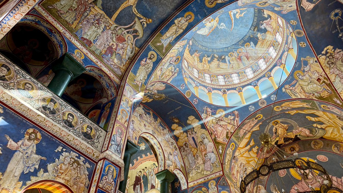 KeensDesign's tweet photo. Inside Church of St. John Vladimir (Hram Sv. Jovana Vladimira) in Bar, Montenegro, you are immediately enveloped in a breathtaking sanctuary of light and color. 🎨 Over 4,860 square meters of vivid Byzantine frescoes adorn the walls and ceilings with sweeping, golden iconography. https://t.co/XNPHNLTwA6