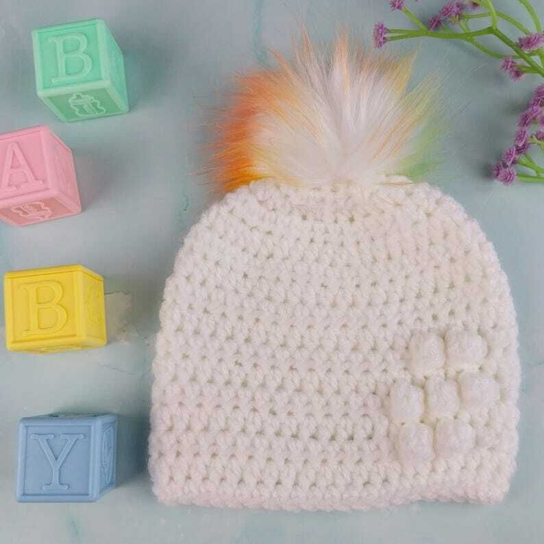 knittingtopia's tweet photo. A white crochet baby hat with a pom pom that didn't get the memo about being subtle! ๐๐ Puff flower on the side, rainbow faux fur on top, for newbornโ3 months.
https://t.co/gn1XnPXSE0
#craftbizparty #MHHSBD #Etsy #HandmadeBabyGift #MadeInUK https://t.co/pEBxdTBun9