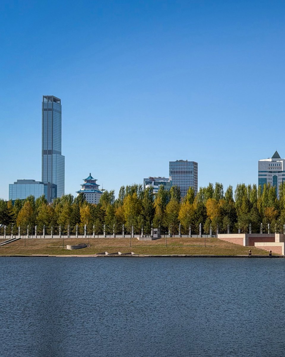 fatimaperezmart's tweet photo. Astana, Kazakhstan. Ak Orda rises across the Esil River, its blue dome and golden spire framed by skyscrapers. The palace shore is off-limits, so the opposite bank is the best view for everyone else. https://t.co/TPmPs86cso