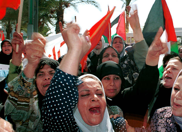 25YearsAgoLive's tweet photo. Palestinian women and children hold an Islamic Jihad rally in support of Osama Bin Laden in Gaza City as men fight from homes in Bethlehem.

Today Israeli tanks and troops moved into Bethlehem to quell the intifada insurgency, causing a sixth day of fighting and protests against the west.