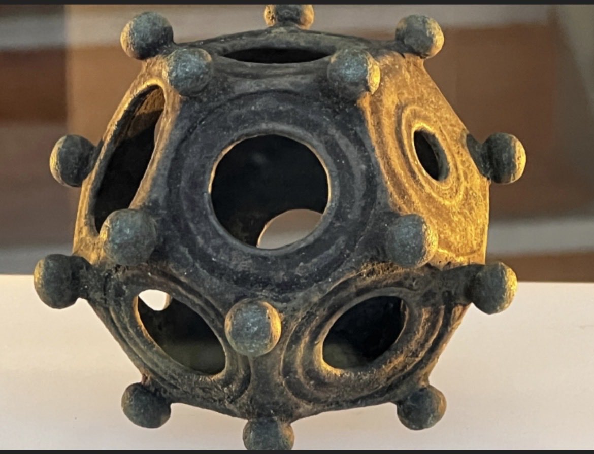 OakieJs's tweet photo. @TheProjectUnity @laurabusse They say no one knows what these dodecahedrons were for. 

But with their various hole sizes and knob hooks, the notion of them being tools for weaving gloves makes SO MUCH SENSE in colder climes.

I now can't unsee this probability. https://t.co/74lmKKgBx0