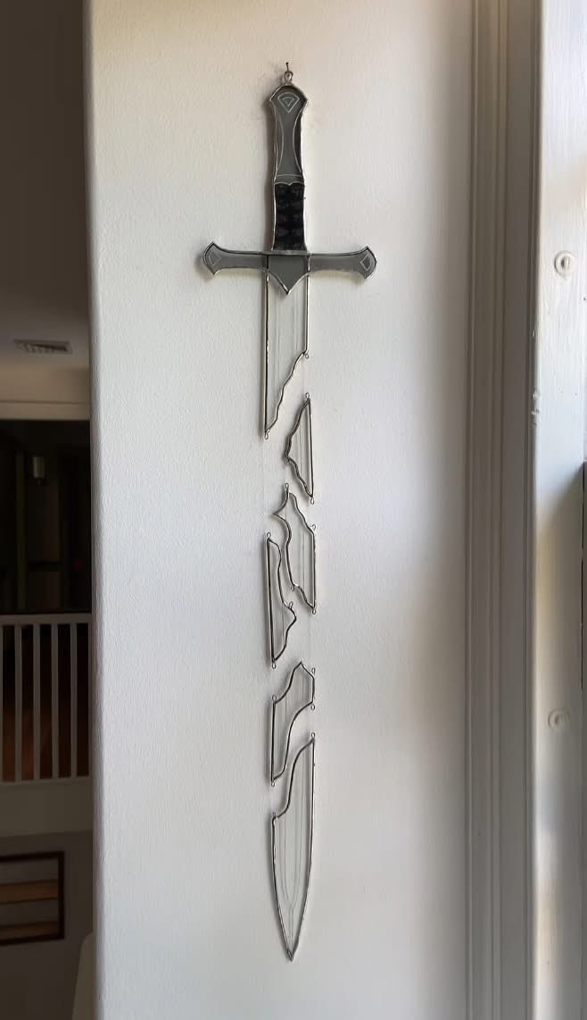 pmamtraveller's tweet photo. stained glass sword and dagger wall hangings created by the artist glassandsnacks [IG] https://t.co/20yfVYKEFH