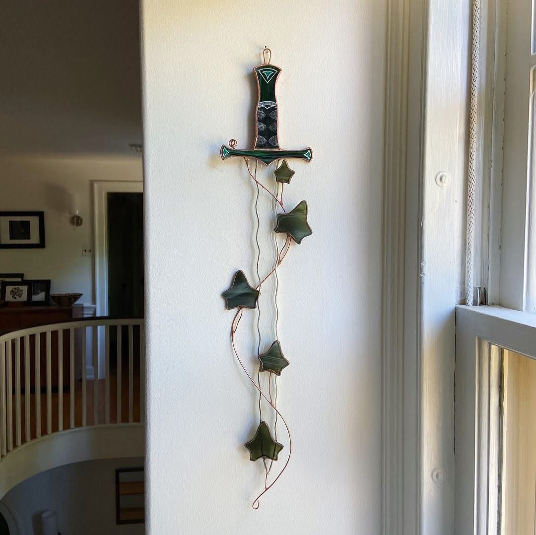 pmamtraveller's tweet photo. stained glass sword and dagger wall hangings created by the artist glassandsnacks [IG] https://t.co/20yfVYKEFH