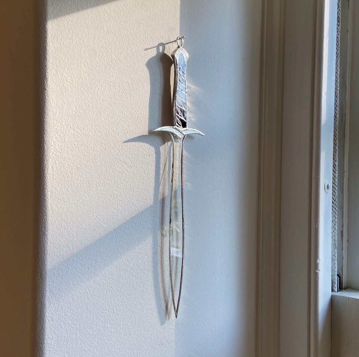 pmamtraveller's tweet photo. stained glass sword and dagger wall hangings created by the artist glassandsnacks [IG] https://t.co/20yfVYKEFH