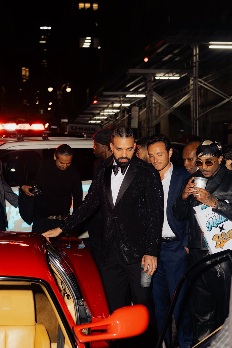 VibeMagazine's tweet photo. Loe Shimmy (@Loeshimmy) pulled up to Drake's 40th birthday party with a red Ferrari for him. 🏎️ https://t.co/dNDIPbuni8