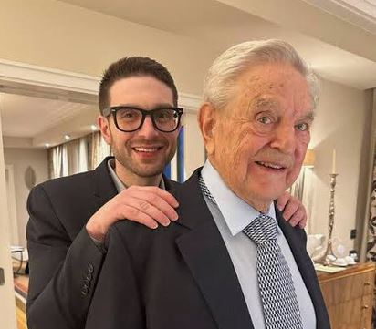 Forgotten_Peeps's tweet photo. FOR THOSE WHO DONT KNOW: That is Alexander soros , the son of European billionaire George soros. The context is that the Soros family basically pumps billions of dollars into US elections through its front groups such as "Open societies foundation". it is well known that at least 21 district attorneys won their elections due to Soros funding. These prosecutors push cashless bail, removal of prosecution for theft, etc at the behest of the soros family who is a bona-fide  force whose misssion is to destroy western civilization. Soros became a billionaire by manipulating global currency exchange rate markets. Alex soros is taking up the family business here in the USA. The meme represents that Slotkin is taking her orders from Soros (which is probably true) .Fun Fact: Alex is  Dating the infamous Huma Abedin who was hillary clinton's personal assistant during her run for election when clinton destroyed hard drives and evidence of he mishandling of classified info .