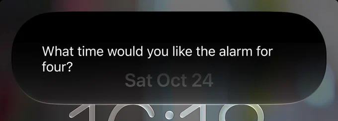 a screenshot of Siri on iOS responding “What time would you like the alarm for four [sic]?”