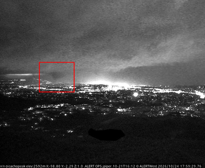 NickKrasz_Wx's tweet photo. It seems that a tornado occurred in Santa Fe, New Mexico this evening around 7 PM MDT. A supercell moved through the area with a distinct velocity couplet, while a webcam image captured a distinct funnel cloud looming over the city. Structural damage has also been reported in the area.