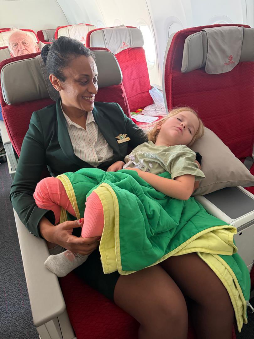 robynkriel1's tweet photo. A picture worth 1,000 words. ❤️

After two wonderful months in Riyadh, we had to leave rather suddenly, without my husband. It was a long, exhausting journey from Bahrain to Addis Ababa and finally home to Bulawayo, Zimbabwe.

On our Ethiopian Airlines flight, we all fell fast asleep. When I woke up, my four-year-old daughter was missing from her seat. I found her a few rows ahead, fast asleep in the arms of a lovely flight attendant named Lydia.

She had woken up crying and confused, and Lydia, not wanting to disturb me, had picked her up, comforted her and rocked her back to sleep. My little girl stayed there for the next three hours.

In the middle of a difficult journey, this beautiful act of kindness meant the world. Thank you, Ethiopian Airlines, and especially Lydia, for reminding us that kindness and humanity know no borders. ❤️