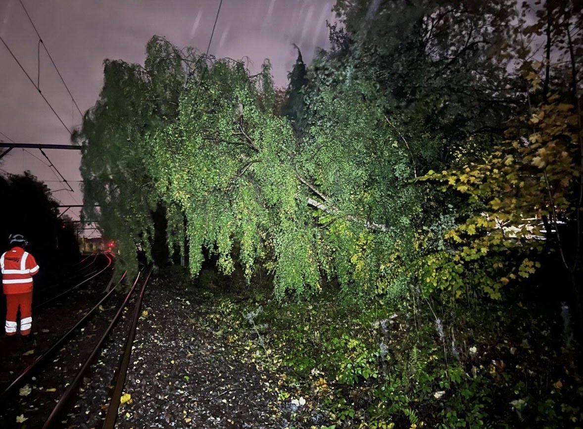 NetworkRailSCOT's tweet photo. 📸 These photos show just some of the damage #stormboelo has caused across Scotland’s railway, including flooding at Dalmarnock station, a flooded culvert at Craigendoran, fallen trees at Partick and damage to overhead wires at Bishopton. https://t.co/ktRX7WDMpG