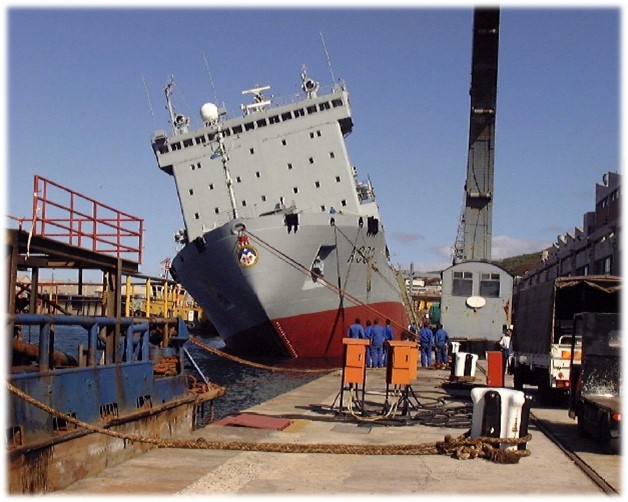 thyphoidjack's tweet photo. SA Naval Heritage Day-by-Day.
25 October:

1939 
The trawler HMSAS Crassula (T19) is commissioned as a mine sweeper for war service.

1957 
SAS Natal (Lt Cdr J.C. Walters) is recommissioned after her conversion to a Hydrographic Survey vessel.

1974 
The second version of the submariner’s qualification badge, an outline of a Daphné class submarine surrounded by a laurel wreath and cut through centrally with a trident, is issued for the first time to replace the original badge.

1981 
SAS Frans Erasmus (Lt Cdr H. Bester), lying 24nm off the coast 85nm north of Beira, acts as a navigational marker for a SAAF C-130 tasked with dropping a raiding team from 5 Reconnaissance Regiment tasked with destroying two bridges over the Pungwe River, inland.
On 29 October after the successful attacks on the bridges, two 4RR barracuda boats from SAS Frans Erasmus recovered the 5RR members from the Pungwe River mouth at Beira. Details of Operation FORCE 1 can be found in the book ‘Iron Fist from the Sea’.

2000 
SAS Outeniqua (Capt G. Knox) develops a list to starboard which increased to 19 degrees shortly after leaving the dry-dock. (Photo)

2010 
Lt K.P. Hughes hands command of SAS Tern to Lt K.R. Mabuse.

2008 
SAS Spioenkop (Capt C. Manig) arrives in Kota Kinabalu, Malaysia. The first South African warship to visit this nation.

PHOTO.
Outeniqua listing heavily to starboard