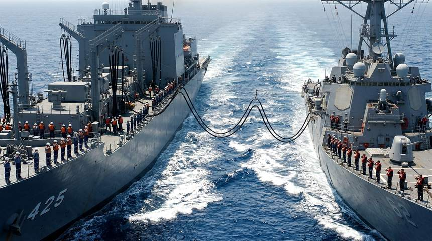japan_nobunaga's tweet photo. How many Americans know that for eight straight years after September 11, Japanese warships stood in 120-degree heat in the Indian Ocean to pump 135 million gallons of free fuel into the U.S. Navy?

After the twin towers fell in 2001, American carrier strike groups raced to the Arabian Sea to strike terrorist strongholds in Afghanistan.

Why could American warships not simply pull into Middle Eastern ports to refuel? Because just one year earlier, suicide bombers in a small boat had blown a forty-foot hole in the destroyer USS Cole in Yemen. Entering port meant risking ambush and losing days off the front line.

Within weeks of 9/11, the Japan Maritime Self-Defense Force dispatched its fleet oilers, including JS Towada, JS Tokiwa, and JS Mashu, ten thousand miles from home.

Sailing side by side with U.S. destroyers and cruisers at twelve knots across heavy ocean swells, Japanese sailors shot steel cables across the water and winched thick rubber fuel hoses into American tanks without spilling a single drop.

From December 2001 to January 2010, Japanese crews completed 939 underway refueling operations. They delivered 510,000 kiloliters, roughly 135 million gallons of fuel, plus 11,000 tons of fresh water, entirely paid for by the Japanese taxpayer.

On the final day of the mission in January 2010, American sailors lined the rails of their warship in the blazing sun, took off their caps, and saluted the Japanese crew as the hoses were uncoupled for the last time.

True loyalty does not ask for a camera. It holds the line for eight years in the sun.