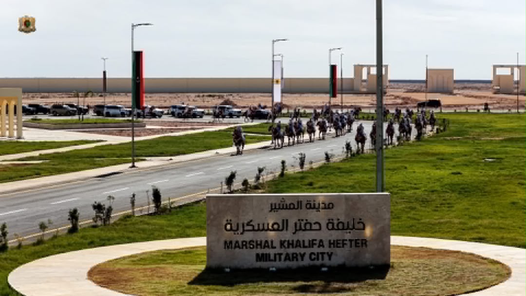 LibyaReview's tweet photo. #PHOTOS 

Libyan Army General Khalifa Haftar inaugurates the Military History Museum at the Khalifa Haftar Military City.

🟡 The inauguration ceremony was attended by Libyan Army Deputy Commander-in-Chief Lieutenant General Saddam Haftar, House of Representatives Speaker Al-Salihin Abdul Nabi, Prime Minister Osama Hammad, and Libya’s Development and Reconstruction Fund Director-General Belgassem Haftar, alongside senior military officials and foreign ambassadors.

🟡 The museum documents major chapters of Libya’s history, from the resistance against Italian colonial rule and the establishment of the Libyan state to the development of its armed forces and their military operations against terrorism.

🟡 Featuring modern interactive technology and simulation rooms described as the first of their kind in North Africa, the museum preserves historical records and military heritage for future generations.

🟡 The opening ceremony included documentary screenings chronicling the army’s battles against terrorism and commemorating personnel killed in those operations.

🟡 Field Marshal Haftar credited the sacrifices of military personnel with restoring security and stability, saying the museum would preserve their legacy and document their contributions to Libya’s security and reconstruction.