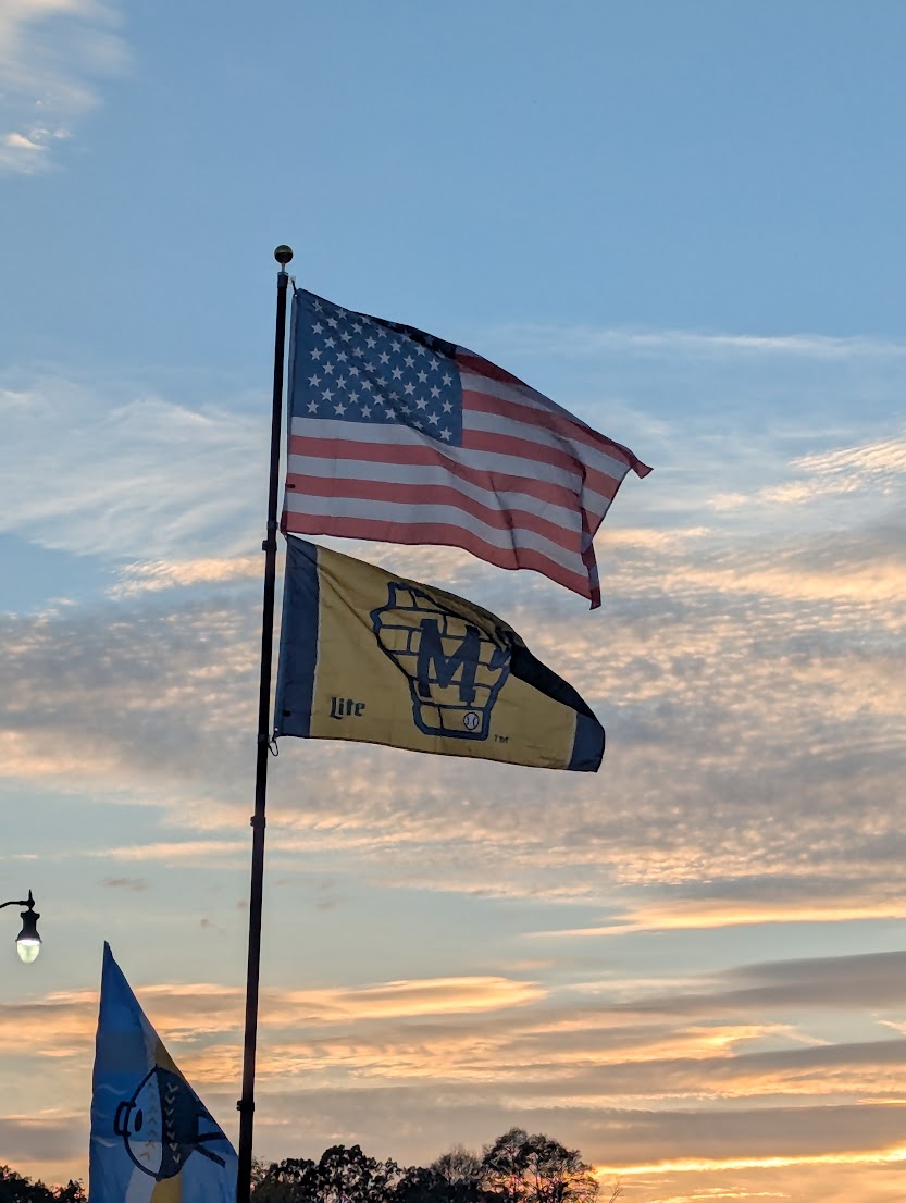 RyanThompson's tweet photo. Caught some cool pics of @Brewers fans flying their flags at an epic #WorldSeries  tailgate. Nice running into friends, the man with the plan @TedPerryFox6, caught the win at @_Dugout_54 &amp; after puting away some burgers thanks to @Charboil. 🔥 1-800-baseball baby. ⚾️ #WinOurWay https://t.co/f442Y0si6r