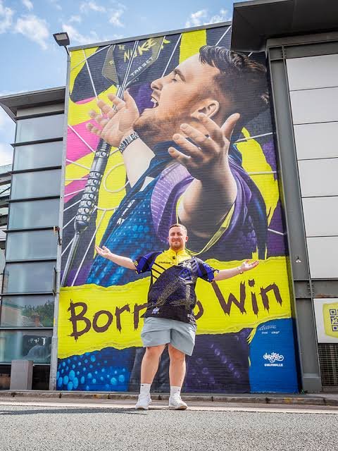 TheNev2847's tweet photo. Luke Littler won every major title before this was painted.
He has failed to win every major title after it was painted.
Curse of the mural? #BornToWin https://t.co/5kC46W0X9z