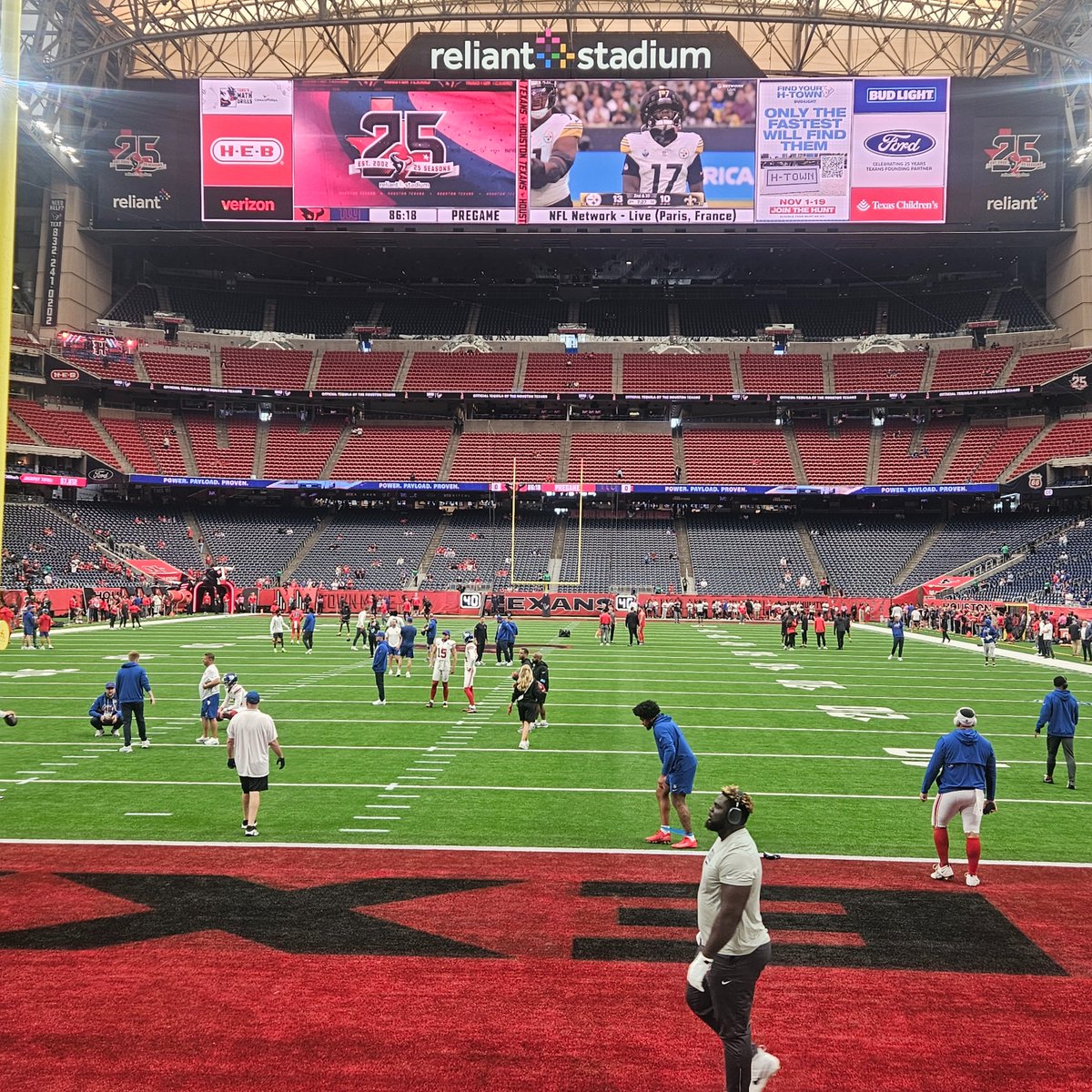 joefav's tweet photo. The #nfl global vision for growth in one image. #NFLPARIS game on big screen #reliantstadium pregame for #giants @HoustonTexans w ad for @NFLFLAG next to the highlights. https://t.co/QpMWHAfLh5