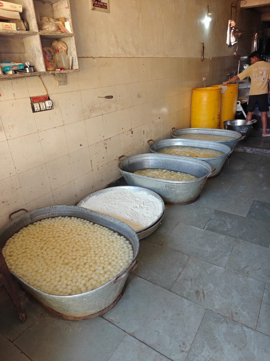 ANI's tweet photo. Delhi | Following instructions from CM Rekha Gupta, the Food Safety Department conducted surprise raids on unlicensed rasgulla manufacturing units in Nihal Vihar and destroyed 402 kilograms of food products. As part of the same operation, 520 kilograms of spoiled khoya (milk solids) and chhena (curdled milk solids) were also destroyed at the Mori Gate Khoya Mandi. Samples were collected for further testing.

(Source: Delhi CMO)