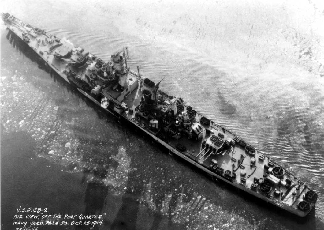 HiddenHistoryYT's tweet photo. Aerial view of large cruiser Guam, Philadelphia Navy Yard, Pennsylvania, United States, 25 October 1944 https://t.co/79amC4lJE1