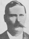 thyphoidjack's tweet photo. General Gerhardus Hendrik Gravett dies 26th October 1900
Gerhardus was born in Alexandria in the Cape and was one of several sons of the 1820 Settler who moved to the Transvaal and were living in the Heidelberg/Boksburg area. He was the great grandson of George Gravett, who arrived in Algoa Bay on the barque Brilliant , then married local girl Anna Adriana Woest. Gerhardus’s brother Willem Hendrik owned a farm just north of the Suikerbosrand at Tamboekiesfontein. One of his uncles was also farming close to Heidelberg at Schoongedacht. But of all the Gravetts in the area, Gerhardus Gravett was the most prosperous. Besides several houses in Georgetown, Germiston, Gerhardus also owned a large smallholding at Klippoortje, Germiston, where he grew maize and raised cattle, and  he was the owner or part-owner of  a number of other farms in the Free State and Cape. He held several prospecting claims. Several of Gerhardus’s business ventures were done in partnership with his younger brother Willem Hendrik.  Besides farming, Gerhardus’s primary business was as a cartage contractor and money lender. His business had premises at the Germiston coal yards, and for the times was very modern in 1899, G H Gravett contractors not only had a telegraphic address, but also a telephone, which was a rarity in the Transvaal at the time.
When war broke out in October 1899, Gerhardus Gravett fought for the Boers, first as a Veld Cornet, then later as a Commandant and finally as Combat General in overall charge of the Boksburg Commando. Both Gerhardus, his first son Christiaan and his brother Willem joined the Boer commandos, and so did several other Gravetts from the area.
Willem was captured by the British, on 16th November 1899 and was sent into exile on St Helena.
After the Siege of Ladysmith was lifted on 28/2/1900, the Boers retreated through northern Natal, back into the Transvaal.
It was at this stage that one section of the Commando under General G H Gravett moved to fight in the Cape Colony. He served with distinction on the Colesberg front, where he was elected field cornet. He was later promoted to commandant.
Later, as the Cape and Orange Free State front collapsed, Gravett took his men back by way of the eastern Orange Free State to the Transvaal to rejoin the rest of the Commando, which had remained active in the Transvaal.
He took part in the Battle of Donkerhoek in June 1900. His men were known as Gravett’s Guinea Fowls. He was heavily involved in the Boers’ attempts to prevent the British capture of the Eastern railway line. In August 1900 he participated in the Battle of Bergendal and was promoted to a fighting general in charge of the Boksburg Commando. The Boksburg Commando had been mobilised on 27 September 1899 and was made up of 1,050 Boers and about 300 black agterryers.
On about 12th October 1900, Gerhardus Gravett was wounded while on commando near Roosenekal.
The Boer forces were fighting a rear guard action and he suffered serious shrapnel wounds while standing next to one of the last artillery pieces of the ZAR State Artillery.
His comrades brought a Dr Neethling to attend to him but without medicines the doctor could not do much, and Gerhardus Gravett contracted bronchitis. He died on 26th October, aged 42. and was buried at Roossenekal on 26 October 1900.
Deneys Reitz, was probably one of the last to see the General alive. Reitz mentions him in his book, "Commando."
His remains were later reinterred here. at the Primrose Cemetery in Germiston. He left a wife, Petronella (nee Oosthuizen,), and five children