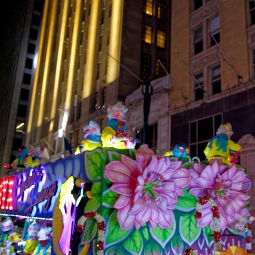 dniumy's tweet photo. In the glow of towering lights, childhood wonder still blooms on city streets. https://t.co/e4gASvOu23