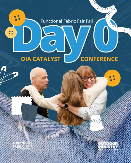 A group of people hugging in front of a blue and denim-themed backdrop with the text "Functional Fabric Fair Fall Day 0 OIA Catalyst Conference." Logos for Functional Fabric Fair and Outdoor Industry are visible.
