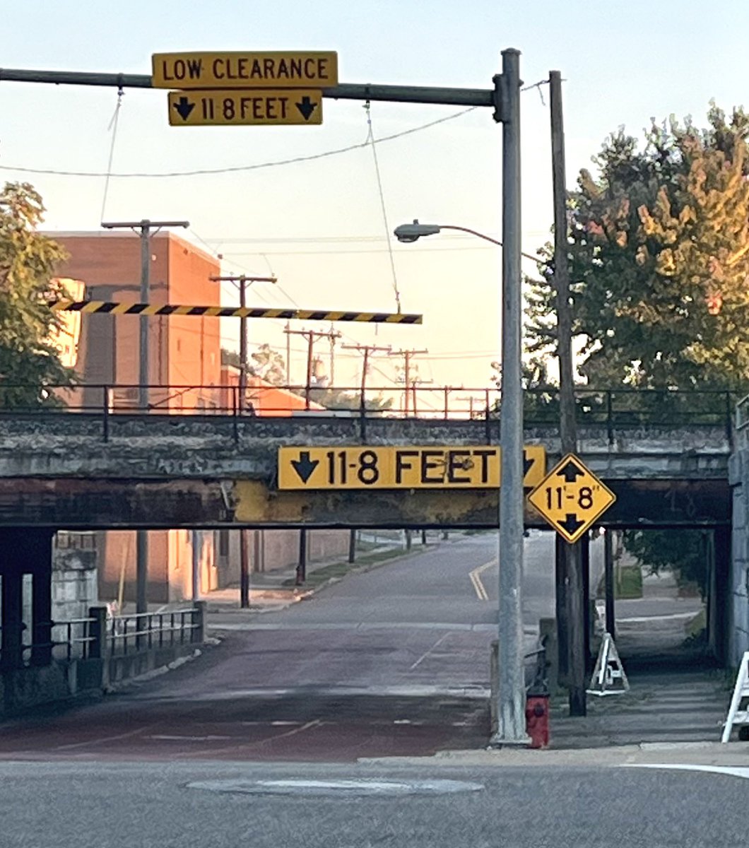 dailystem's tweet photo. 3 different signs indicating 11’8” https://t.co/1ydW34yHq9