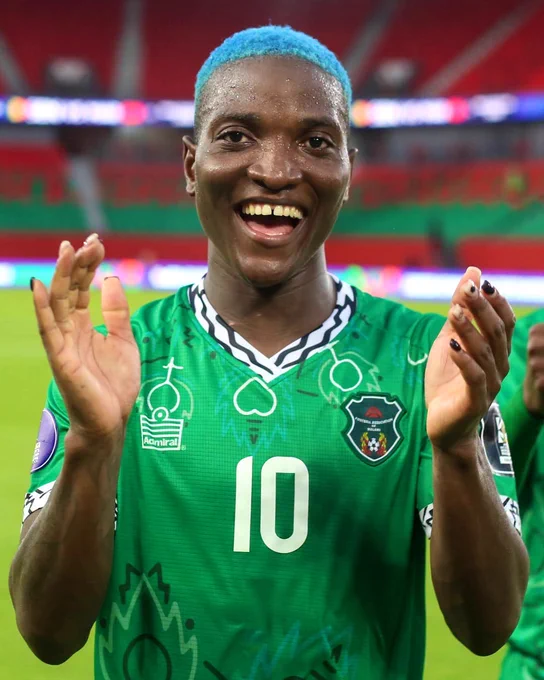 Temwa celebrating after a Malawi match
